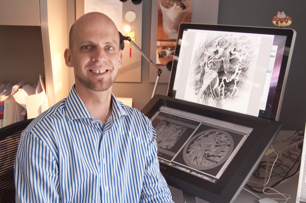  Perth Mint designer Ton Vaughan at his computer, with the Zeus concept art 