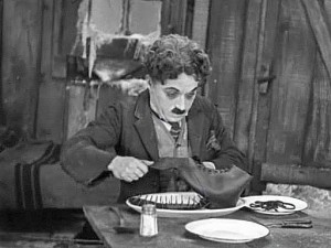 Charlie Chaplin's "Little Tramp" is forced to eat his own shoe to survive the Klondike winter in 1925's "The Gold Rush"