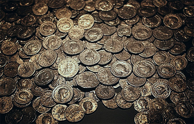 Hoard of 8,000 Roman Coins Found by Treasure Hunter